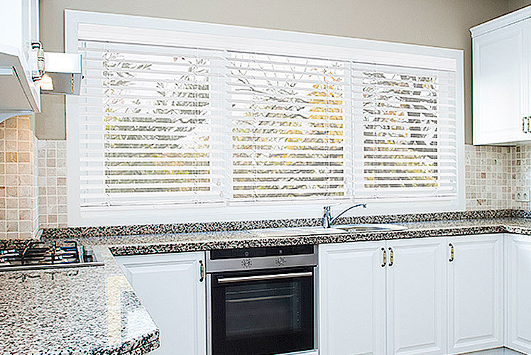 Aria Faux Wood Blinds in the Kitchen